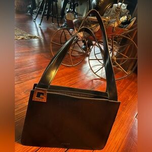 Vintage Guess women’s black handbag with silver detailing